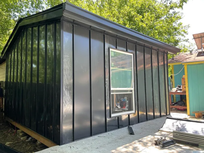 Black standing seam metal wall panels for Roof Inspection in Kingsville