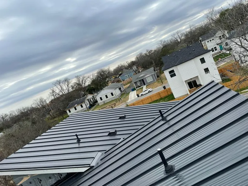 Standing seam metal roof panels with vents for Skylight Repair in Kingsville
